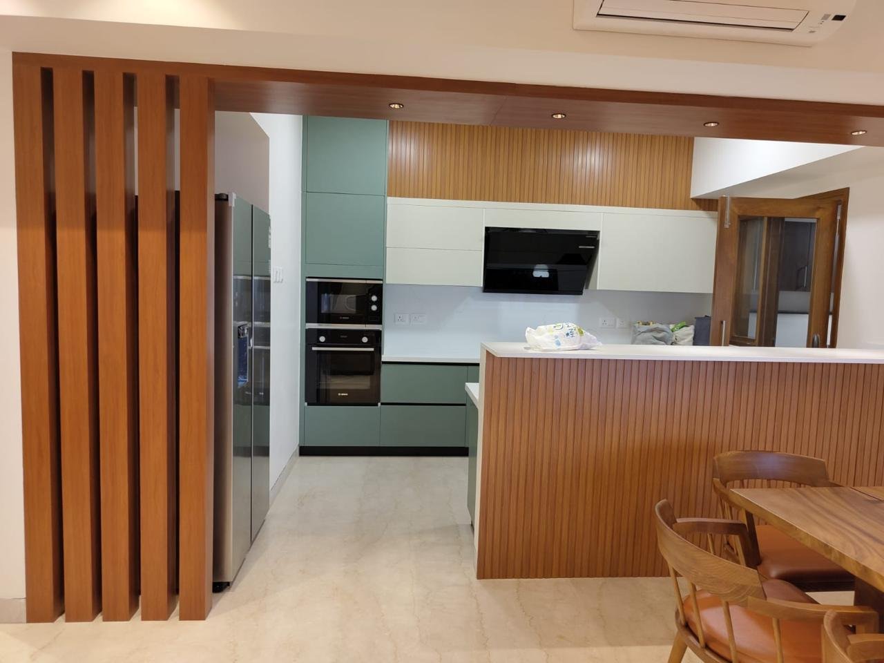 Fluted Teak Joinery and Breakfast Bar